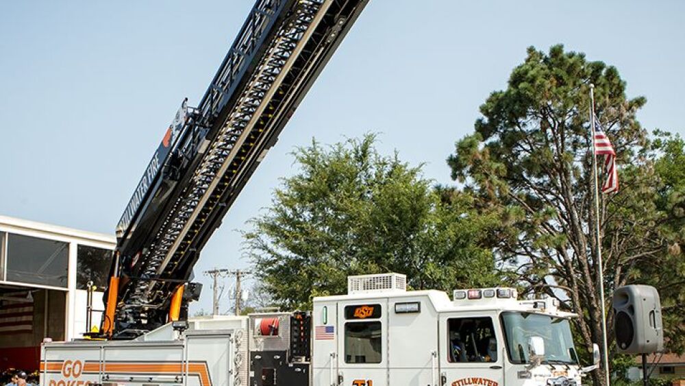 osu_branded_firetruck_ladderup2.jpg