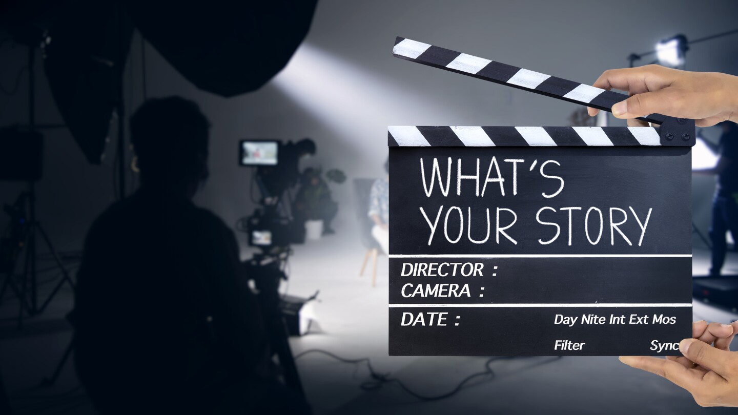 What's your story, Handwriting on film slate or clapperboard .film crew working in the studio.