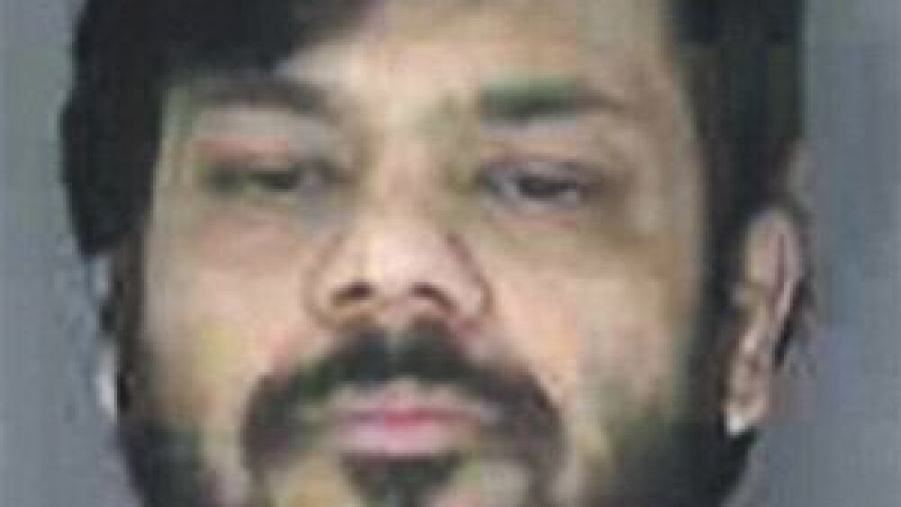 Police: Murderer tried to bribe CO, flee