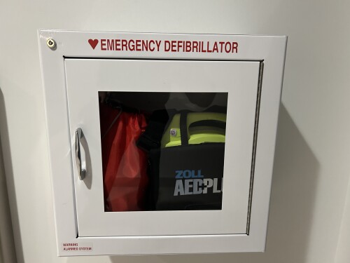 AED Emergency Defibrillator in a Cabinet
