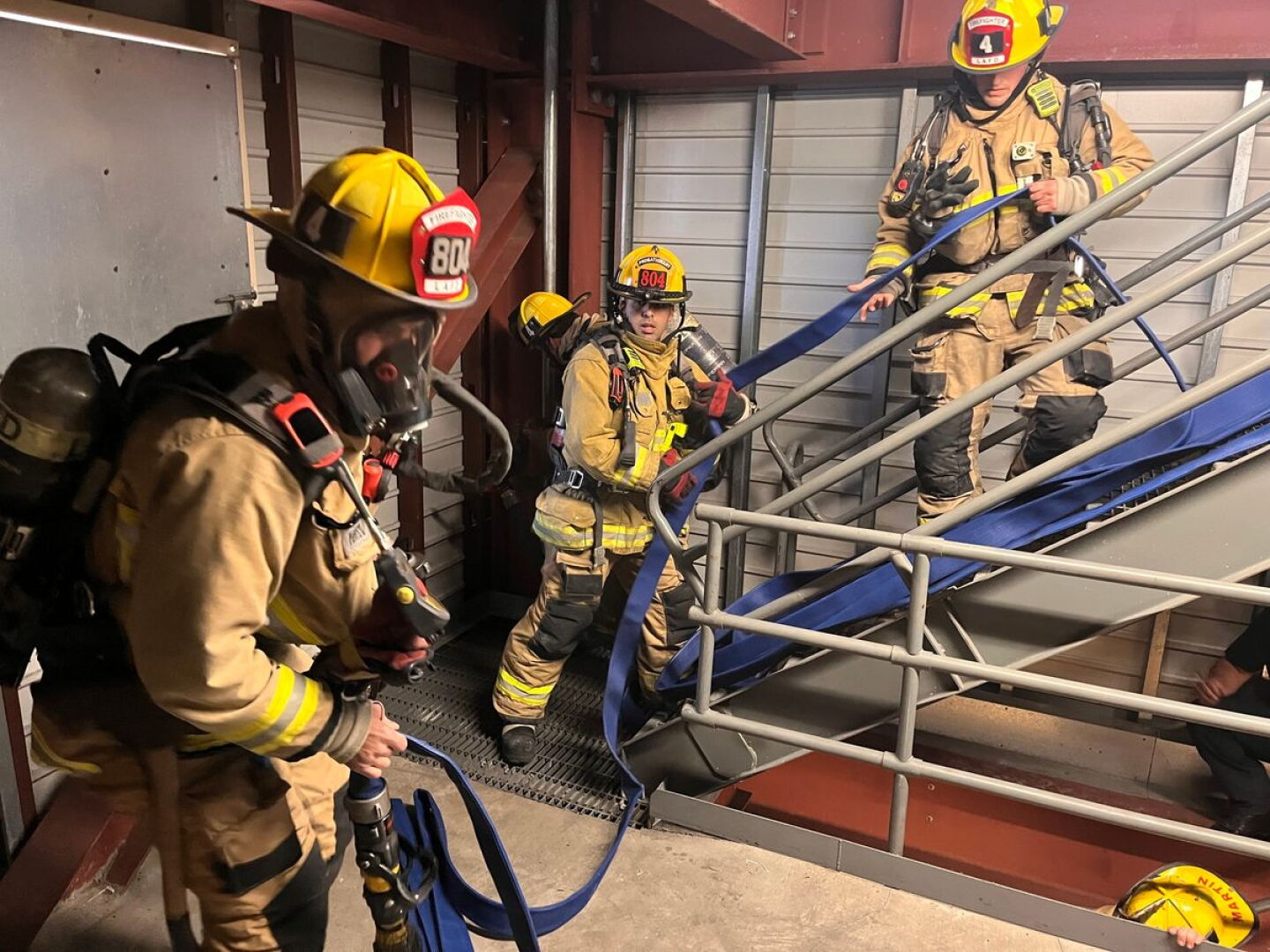 High Rise Fireman Photo of the Week: Practicing with high-rise hose packs