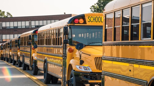 School buses lined up ready to pick up kids