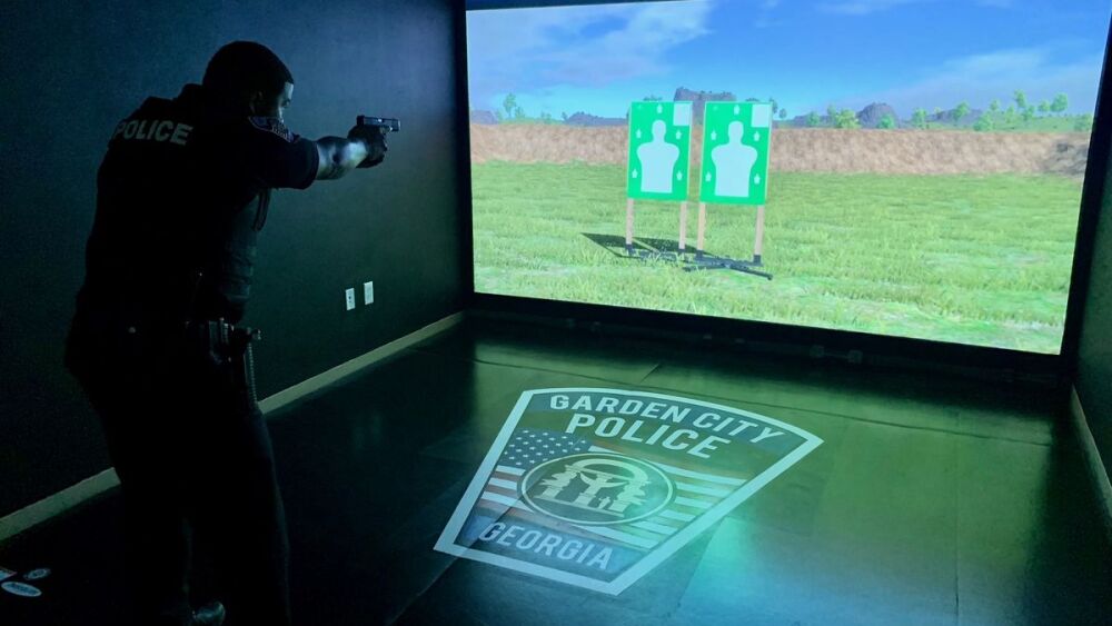 Garden City PD officer takes aim using the VirTra simulator