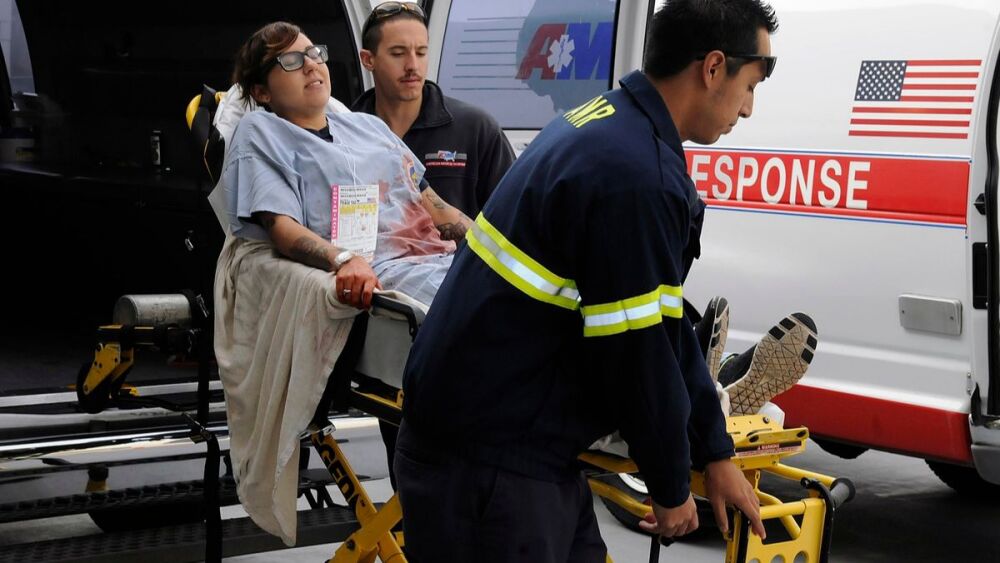 US_Navy_111117-N-KR503-059_Paramedics_deliver_a_simulated_casualty_to_Naval_Medical_Center_San_Diego_(NMCSD)_during_a_command-wide_mass_casualty_dr-2.jpg