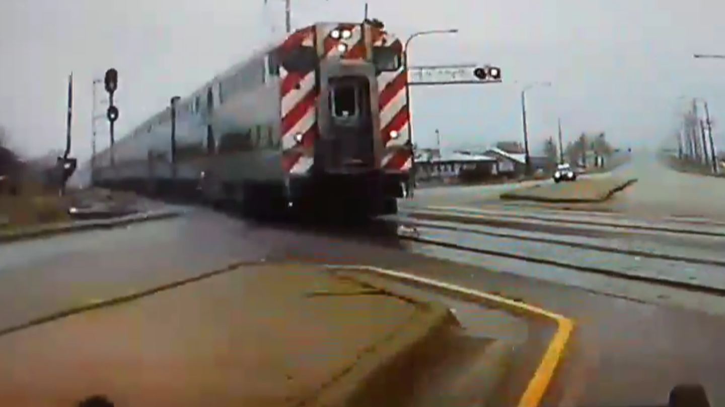 Train Swerving Video: Ill. LEO swerves off road to avoid being hit by train