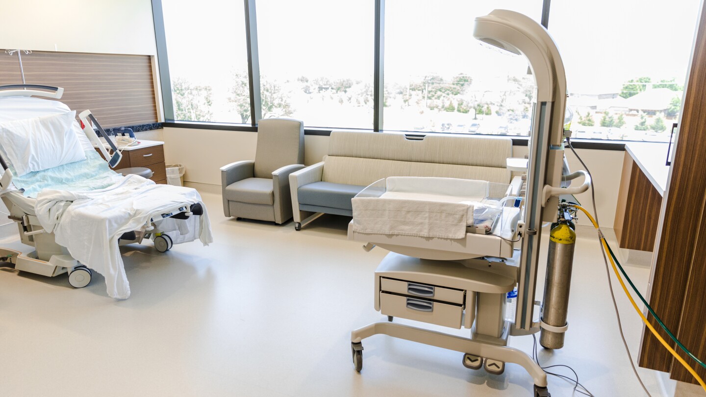Empty hospital room prepared for delivery of a newborn