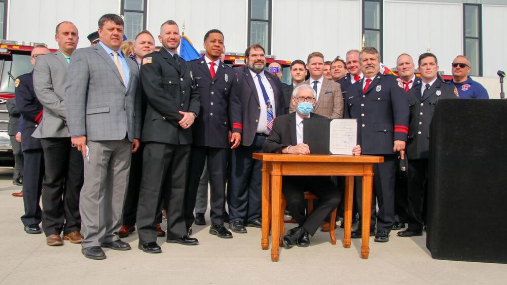 wisconsin ptsd fire station bill signing workers compensation