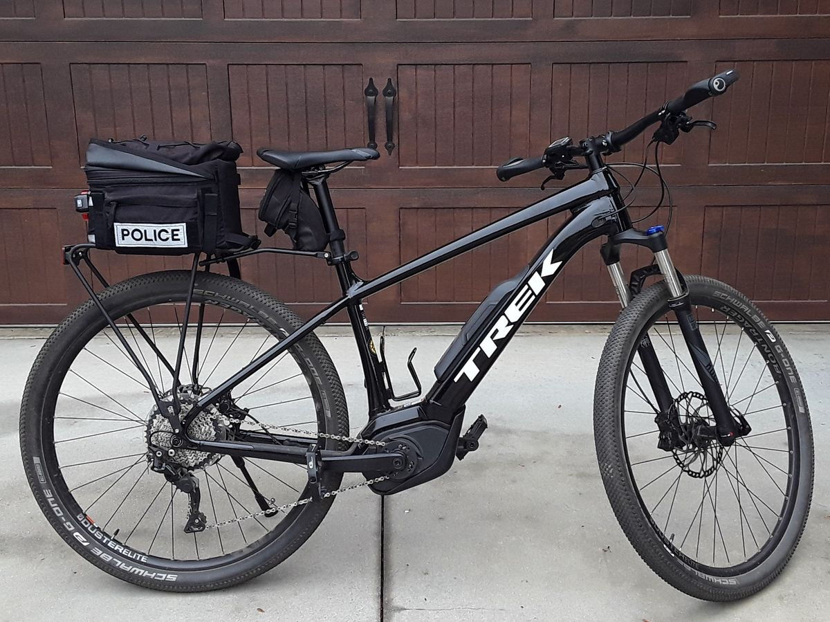 trek police bicycle Service 12-Speed MTB Black Trek Urged To Divest From