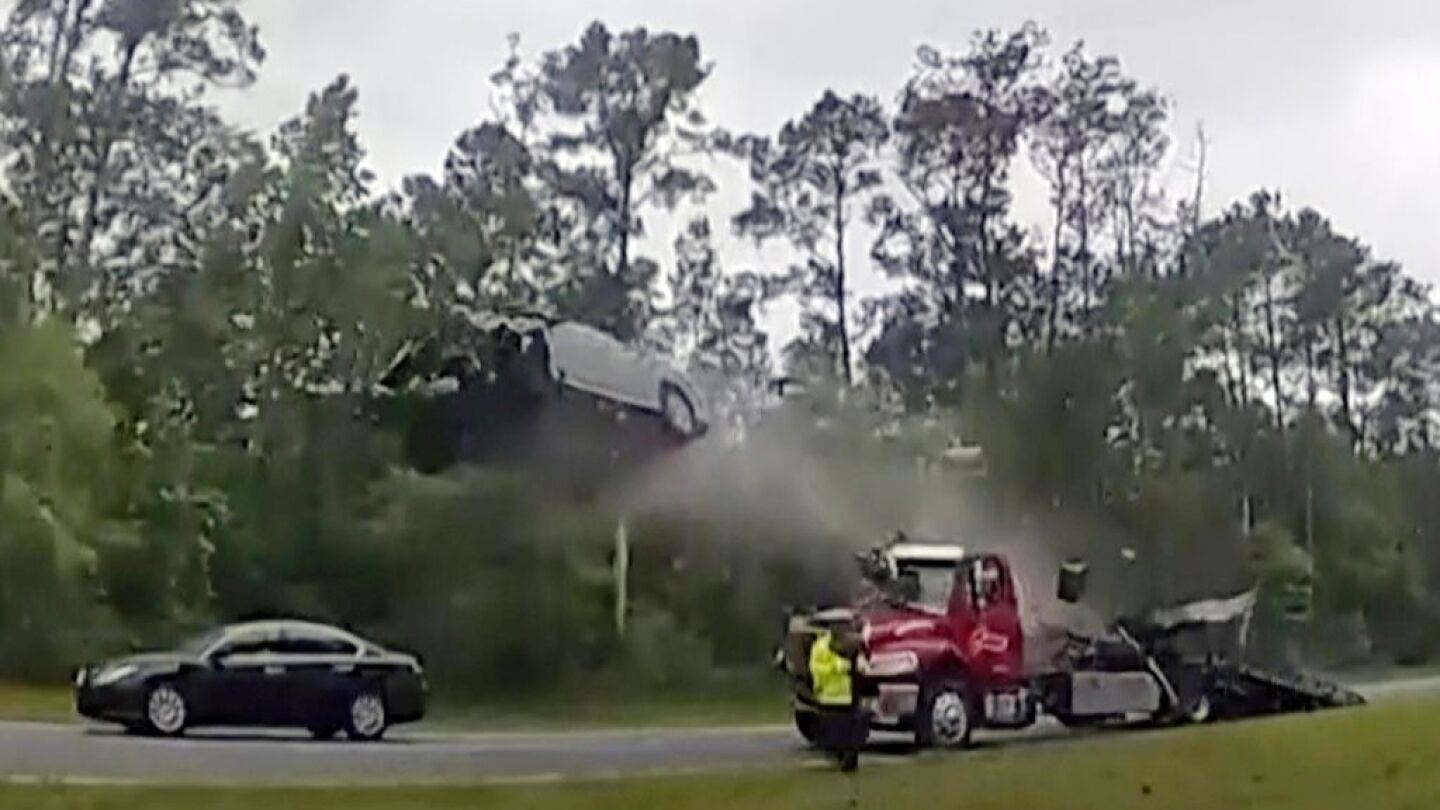 Video Car goes airborne at Ga. crash scene